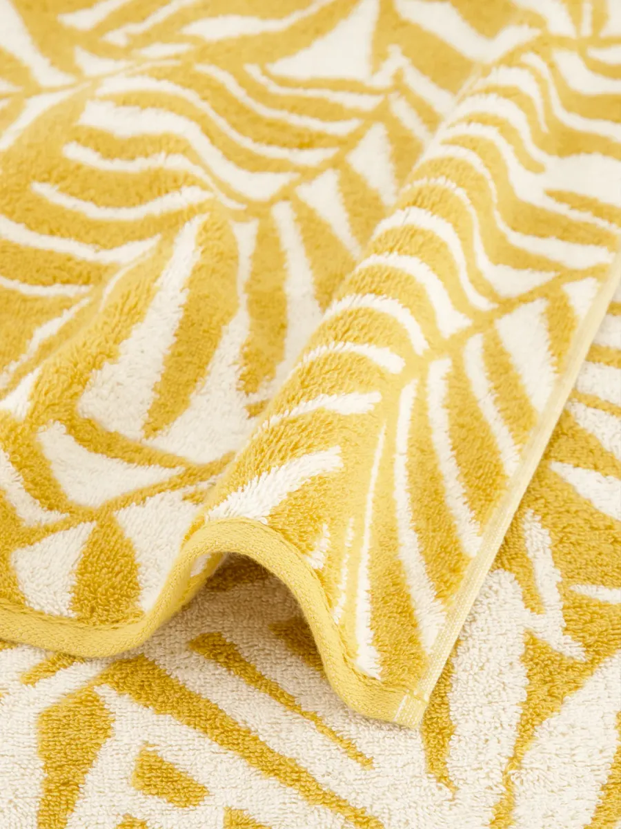 CAWÖ MAISON LEAVES HÅNDKLE - GOLD
